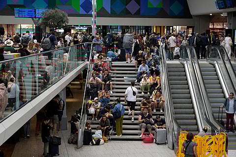 Travelers wait at Gare de Montparnasse